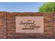 Sunland Village 55+ community sign set in a beautiful stone wall at 720 S Rosemont --, Mesa, AZ 85206