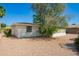 Rear exterior view with desert landscaping, including mature shade trees at 720 S Rosemont --, Mesa, AZ 85206