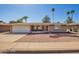 Charming single-story home with a well-maintained desert landscape and a spacious two-car garage at 720 S Rosemont --, Mesa, AZ 85206