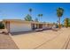 Attractive single-story home with a well-kept desert landscape and a convenient attached garage at 720 S Rosemont --, Mesa, AZ 85206