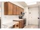 Well-lit kitchen with modern appliances, sleek countertops, and plenty of cabinet storage for a functional cooking space at 720 S Rosemont --, Mesa, AZ 85206