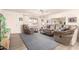 Bright living room features modern furniture, neutral tones, and ample natural light for comfortable living at 720 S Rosemont --, Mesa, AZ 85206