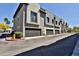 View of modern townhomes featuring attached garages and contemporary architectural details at 7531 E Billings St # 131, Mesa, AZ 85207