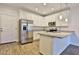 Modern kitchen with stainless steel appliances, granite countertops, and white cabinets at 7531 E Billings St # 131, Mesa, AZ 85207