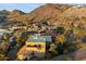 Stunning aerial view of a desert neighborhood nestled amidst mountains and lush greenery, offering privacy at 7631 N 20Th St, Phoenix, AZ 85020