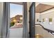 Bright foyer with wooden ceiling, staircase, and natural light from exterior window at 7631 N 20Th St, Phoenix, AZ 85020