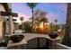 An inviting gated entrance with desert landscaping and a paved drive at 7631 N 20Th St, Phoenix, AZ 85020
