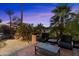 Cozy outdoor patio with comfortable seating, lush landscaping, and tranquil ambiance, perfect for relaxing and enjoying the outdoors at 7631 N 20Th St, Phoenix, AZ 85020