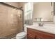 Bathroom with a tiled shower and updated vanity at 870 E Tonto Pl, Chandler, AZ 85249