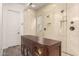Elegant bathroom featuring a seamless glass shower enclosure and tile surround at 870 E Tonto Pl, Chandler, AZ 85249