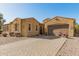 Charming single-story home with a red motorcycle, desert landscaping, and inviting curb appeal at 870 E Tonto Pl, Chandler, AZ 85249