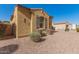 Charming single-story home with desert landscaping, wooden shutters, and inviting curb appeal at 870 E Tonto Pl, Chandler, AZ 85249