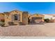 Charming single-story home with a red motorcycle, desert landscaping, and inviting curb appeal at 870 E Tonto Pl, Chandler, AZ 85249
