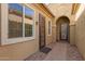 Inviting entryway featuring a decorative glass door and a small, well-maintained walkway at 870 E Tonto Pl, Chandler, AZ 85249