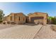 Charming single-story home with a red motorcycle, desert landscaping, and inviting curb appeal at 870 E Tonto Pl, Chandler, AZ 85249