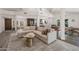 Bright living area with neutral color palette, vaulted ceilings, and open layout for easy entertaining at 8719 E San Marino Dr, Scottsdale, AZ 85258