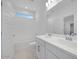 Bright bathroom with double vanity and bathtub at 8865 W Orange Dr, Glendale, AZ 85305