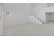 Bright living room with high ceilings, natural light, and tiled floors at 8865 W Orange Dr, Glendale, AZ 85305