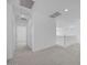 An upstairs area featuring neutral carpet and white walls at 8865 W Orange Dr, Glendale, AZ 85305