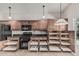 Kitchen with modern appliances, granite countertops, and plenty of cabinet storage at 8911 E Sutton Dr, Scottsdale, AZ 85260