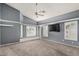 Large bedroom with a sitting area and oversized windows at 8911 E Sutton Dr, Scottsdale, AZ 85260