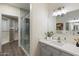 Bright bathroom featuring a modern walk-in shower and stylish vanity at 9555 E Raintree Dr # 1055, Scottsdale, AZ 85260