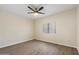 Bright bedroom with neutral walls, ceiling fan, and wood-look floors at 9555 E Raintree Dr # 1055, Scottsdale, AZ 85260