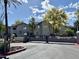 Gated community entrance offers privacy and security with beautiful landscaping at 9555 E Raintree Dr # 1055, Scottsdale, AZ 85260
