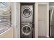 Stacked laundry machines are visible with natural light at 9555 E Raintree Dr # 1055, Scottsdale, AZ 85260