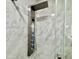 Close-up of modern wall-mounted shower system with multiple spray settings at 9555 E Raintree Dr # 1055, Scottsdale, AZ 85260