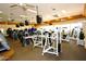 Well-equipped fitness center featuring treadmills, weight machines, and various exercise equipment at 9649 E Holiday Way, Sun Lakes, AZ 85248