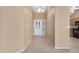 Inviting foyer features neutral walls, tile flooring, and a decorative glass front door at 9649 E Holiday Way, Sun Lakes, AZ 85248