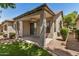 Covered patio with a ceiling fan, providing a comfortable outdoor living space with a view at 9649 E Holiday Way, Sun Lakes, AZ 85248