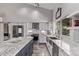 Bright kitchen featuring stainless steel appliances and sleek countertops at 9736 E Ironwood Dr, Scottsdale, AZ 85258