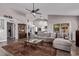Spacious living room with vaulted ceilings and an open floor plan at 9736 E Ironwood Dr, Scottsdale, AZ 85258