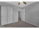 Bedrooms feature a closet and ceiling fan and is the perfect place to recharge at 10743 W Frier Dr, Glendale, AZ 85307