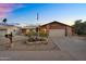 Charming single-story home featuring a well-maintained yard and two-car garage at 10743 W Frier Dr, Glendale, AZ 85307