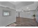 Bright and open living space with new floors and neutral tones at 10743 W Frier Dr, Glendale, AZ 85307