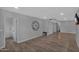 Open living area with ample space, modern decor, and neutral wall color at 10743 W Frier Dr, Glendale, AZ 85307