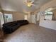 Inviting living room with tile floors, neutral walls, and ample seating at 1612 E Barbarita Ave, Gilbert, AZ 85234