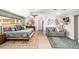 Stylish bedroom features a cozy sitting area, plush textiles and serene ambiance at 1744 E Huber St, Mesa, AZ 85203