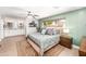 Bright bedroom with stylish furnishings, ceiling fan and modern decor at 1744 E Huber St, Mesa, AZ 85203