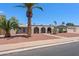 Well-maintained home featuring beautiful desert landscaping and architectural details at 1744 E Huber St, Mesa, AZ 85203
