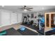 Well-equipped home gym featuring various machines and free weights at 1744 E Huber St, Mesa, AZ 85203
