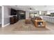 Bright living room featuring a sleek fireplace and contemporary decor at 1744 E Huber St, Mesa, AZ 85203