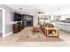 Cozy living room featuring a modern fireplace, comfortable seating, and stylish decor at 1744 E Huber St, Mesa, AZ 85203