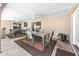 Spacious covered patio with dining area and ping pong table, perfect for outdoor entertaining at 1744 E Huber St, Mesa, AZ 85203