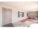 This covered patio features a neutral color scheme, tiled floors, and outdoor seating at 1744 E Huber St, Mesa, AZ 85203