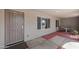 Covered patio with tile flooring, seating area, and views of the surrounding landscape at 1744 E Huber St, Mesa, AZ 85203