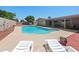 Enjoy the backyard pool with ample space for lounge chairs and entertaining at 1744 E Huber St, Mesa, AZ 85203